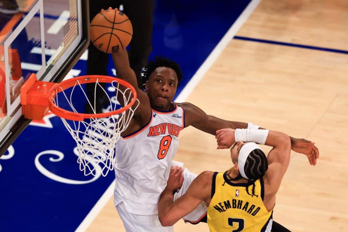 The Knicks' small forward #08 OG Anunoby tries to shoot past the Pacers' point guard #02 Andrew Nembhard during Game Five of the Eastern Conference Finals of the 2025 NBA Playoffs between the New York Knicks and the Indiana Pacers at Madison Square Garden in New York on May 29, 2025. CHARLY TRIBALLEAU / AFP