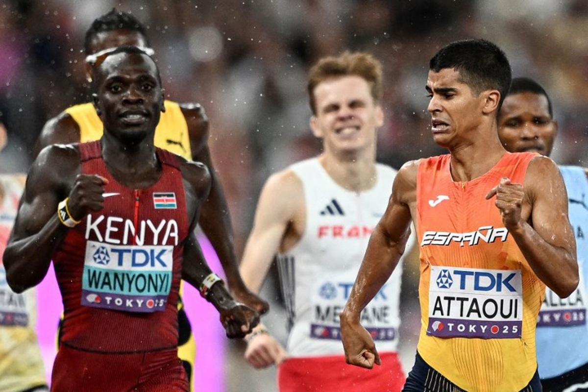 Kenya's Emmanuel Wanyonyi (L) and Spain's Mohamed Attaoui compete in the men's 800m semi-final during the World Athletics Championships in Tokyo on September 18, 2025. Jewel SAMAD / AFP