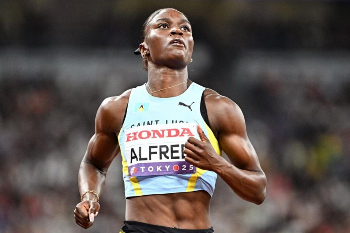 Saint Lucia's athlete Julien Alfred reacts in the women's 100m semi-final during the World Athletics Championships in Tokyo on September 14, 2025. Jewel SAMAD / AFP