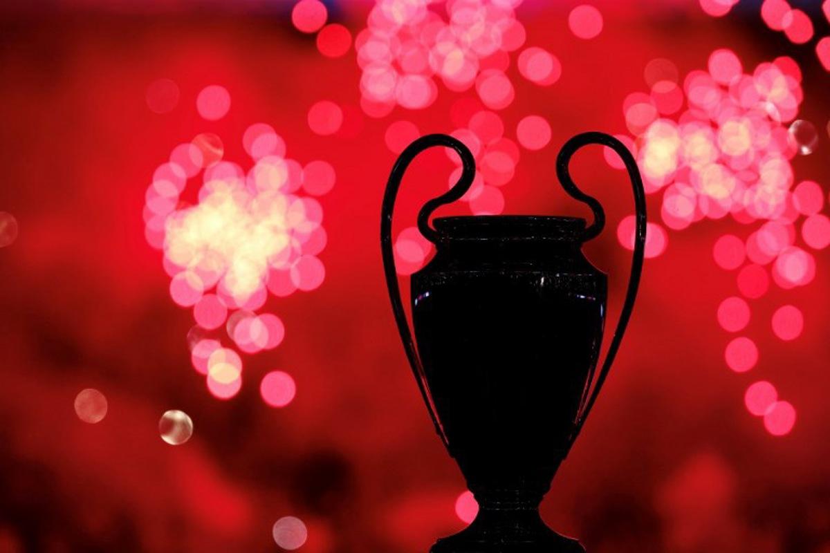 The silhouette of the UEFA Super Cup trophy is seen as the club celebrate the 2024-2025 season's trophies (Ligue 1, Coupe de France, Trophée des Champions, the UEFA Champions League) after the French L1 football match between Paris Saint-Germain (PSG) and Angers SCO at the Parc des Princes Stadium in Paris on August 22, 2025. FRANCK FIFE / AFP