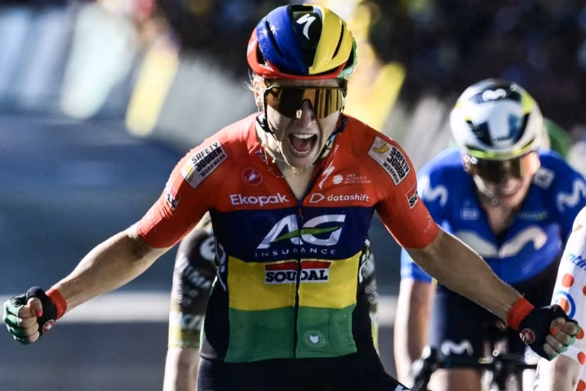 AG Insurance-Soudal Team's Mauritian rider Kim Le Court-Pienaar celebrates as she crosses the finish line to win the 6th (out of 9) stage of the fifth edition of the Women's Tour de France cycling race, 153.4 km from Montbrison to Tournon-sur-Rhone, in Tournon-sur-Rhone, central-eastern France on August 6, 2026. NICOLAS TUCAT / AFP