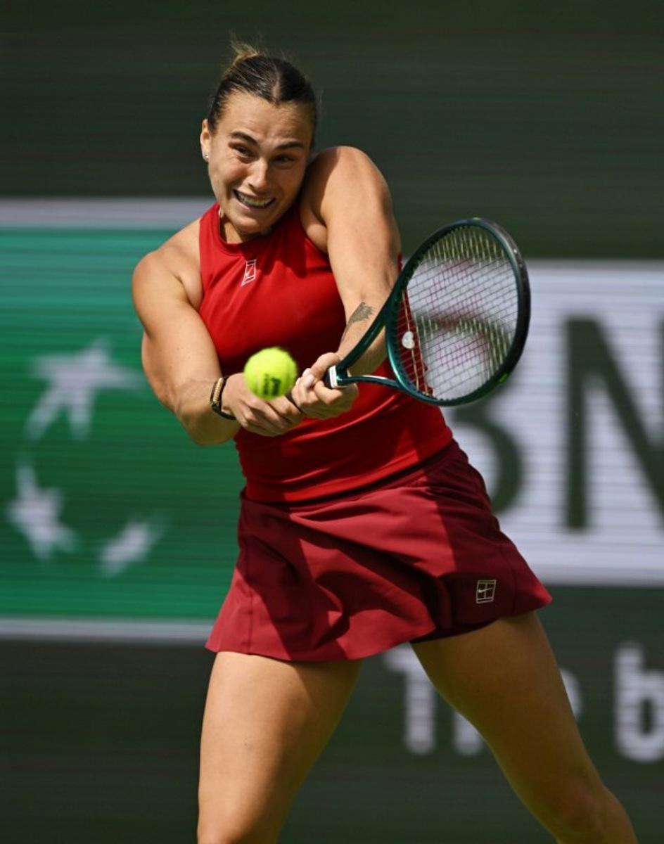 Belarus' Aryna Sabalenka returns the ball to Russia's Mirra Andreeva during the women's singles final tennis match at the BNP Paribas Open at the Indian Wells Tennis Garden in Indian Wells, California, on March 16, 2025. Patrick T. Fallon / AFP