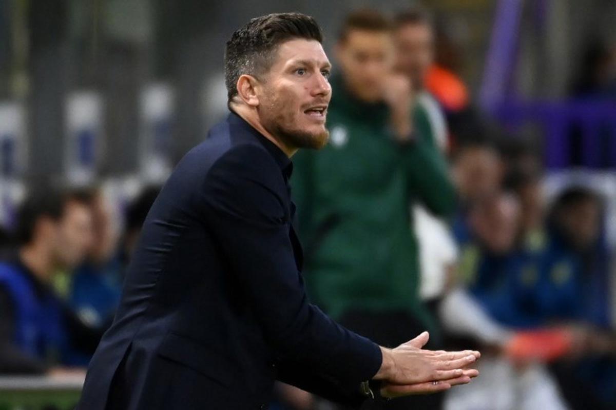 Union's Belgian head coach Sebastien Pocognoli shouts instructions to his players from the touchline during the UEFA Champions League, league phase - Matchday 2 football match between Royale Union Saint-Gilloise and Newcastle United FC at the RSC Anderlecht Stadium in Brussels on October 1, 2025. JOHN THYS / AFP