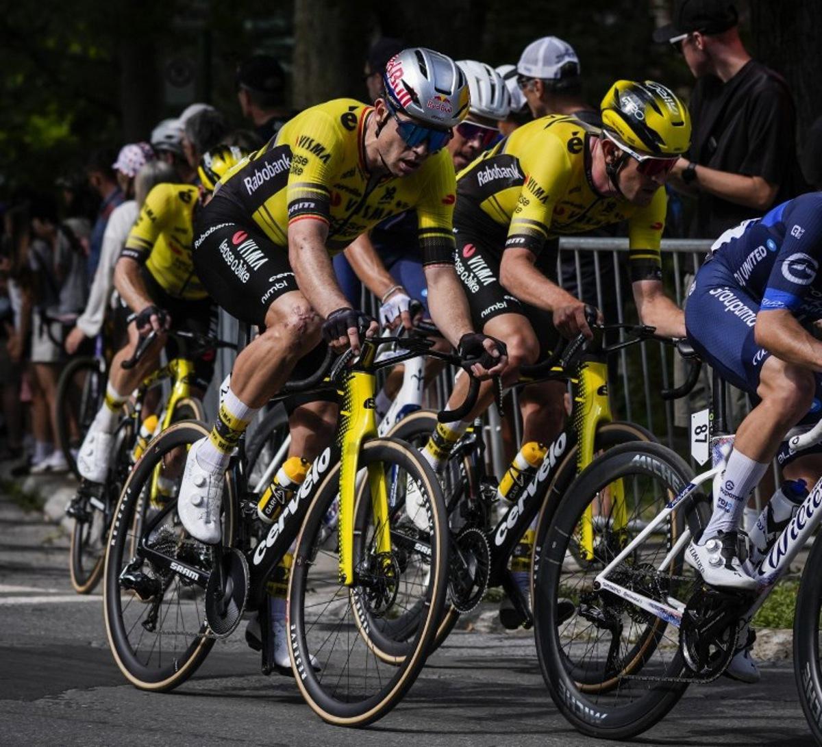 Belgium's Wout van Aert, with Team Visma-Lease a Bike, cycles during the 14th Grand Prix Cycliste de Montreal cycling road race in Montreal, Canada, on September 14, 2025. MATHIEU BELANGER / AFP