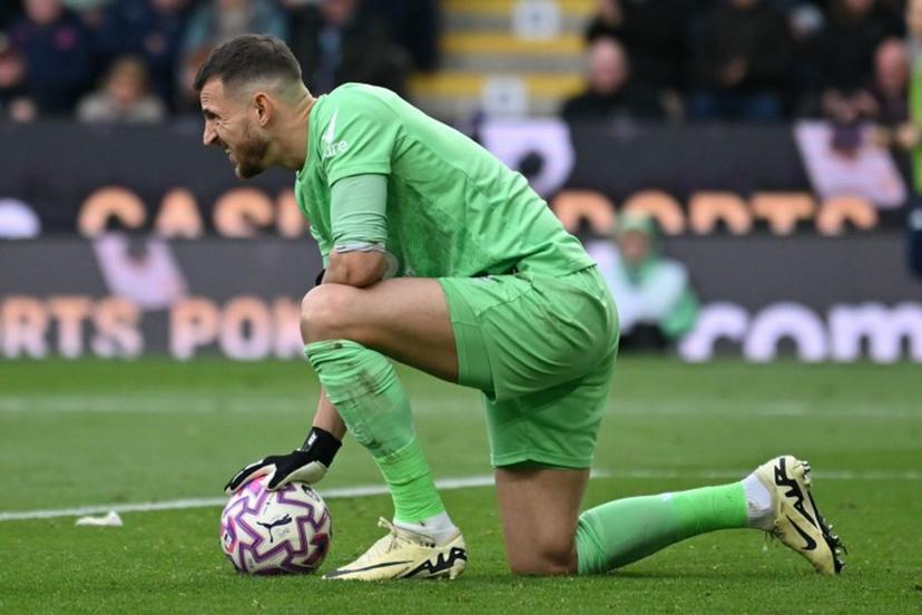 Burnley's Slovakian goalkeeper #01 Martin Dubravka reacts during the English Premier League football match between Burnley and Leeds United at Turf Moor in Burnley, north-west England on October 18, 2025. ANDY BUCHANAN / AFP
