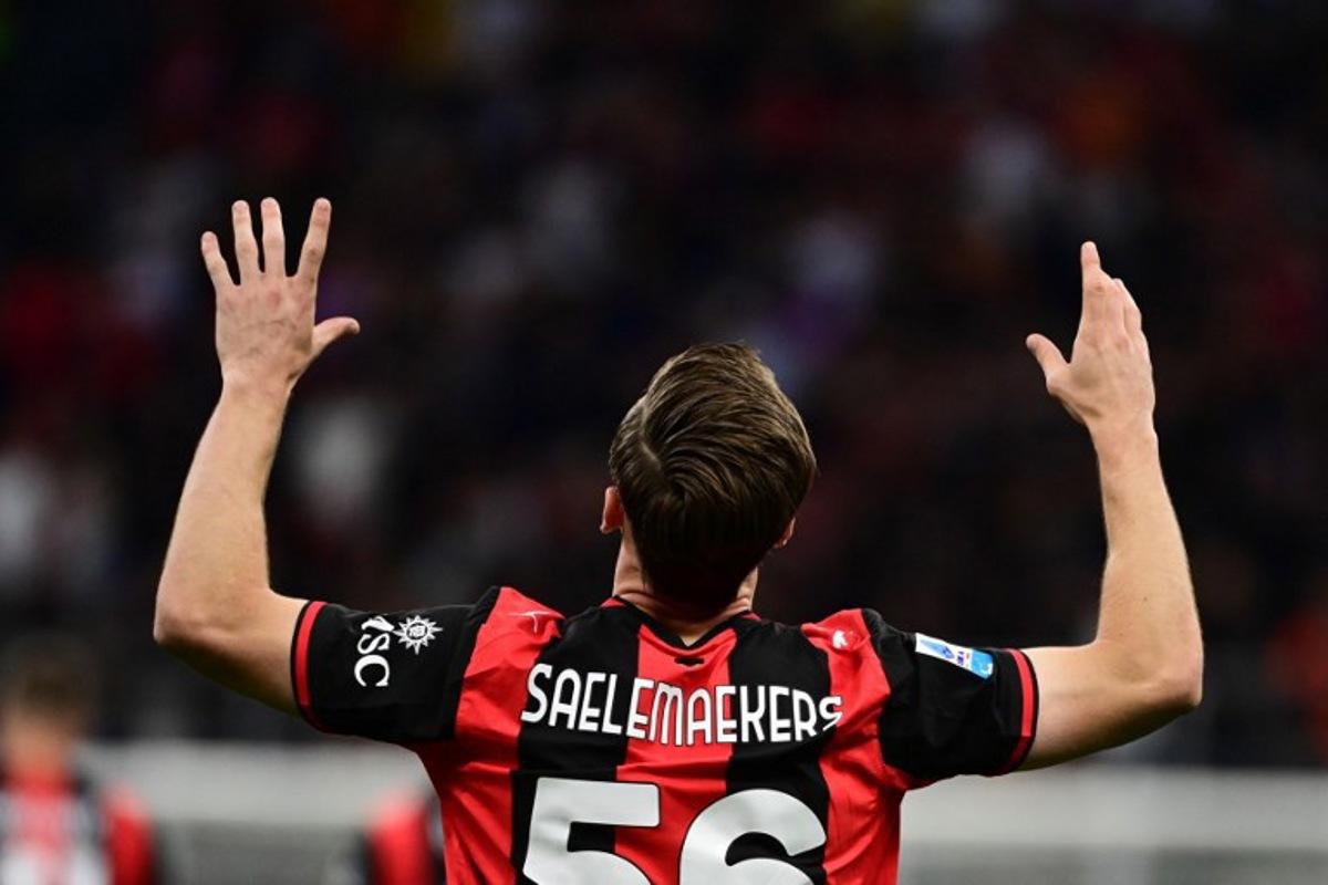 AC Milan's Belgian midfielder #56 Alexis Saelemaekers celebrates after scoring his team's first goal during the Italian Serie A football match between AC Milan and Cagliari at the San Siro Stadium in Milan on May 24, 2026. Piero CRUCIATTI / AFP