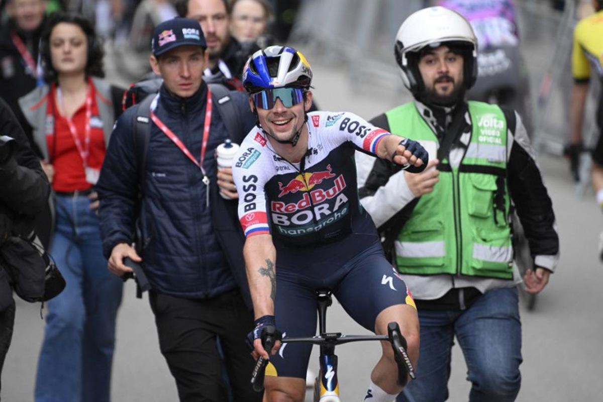 Team Bora's Primoz Roglic celebrates winning the 4th stage of the 2025 Volta a Catalunya cycling tour of Catalonia, a 188,7 km race between Sant Vicenc de Castellet and Montserrat, on March 27, 2025. Josep LAGO / AFP