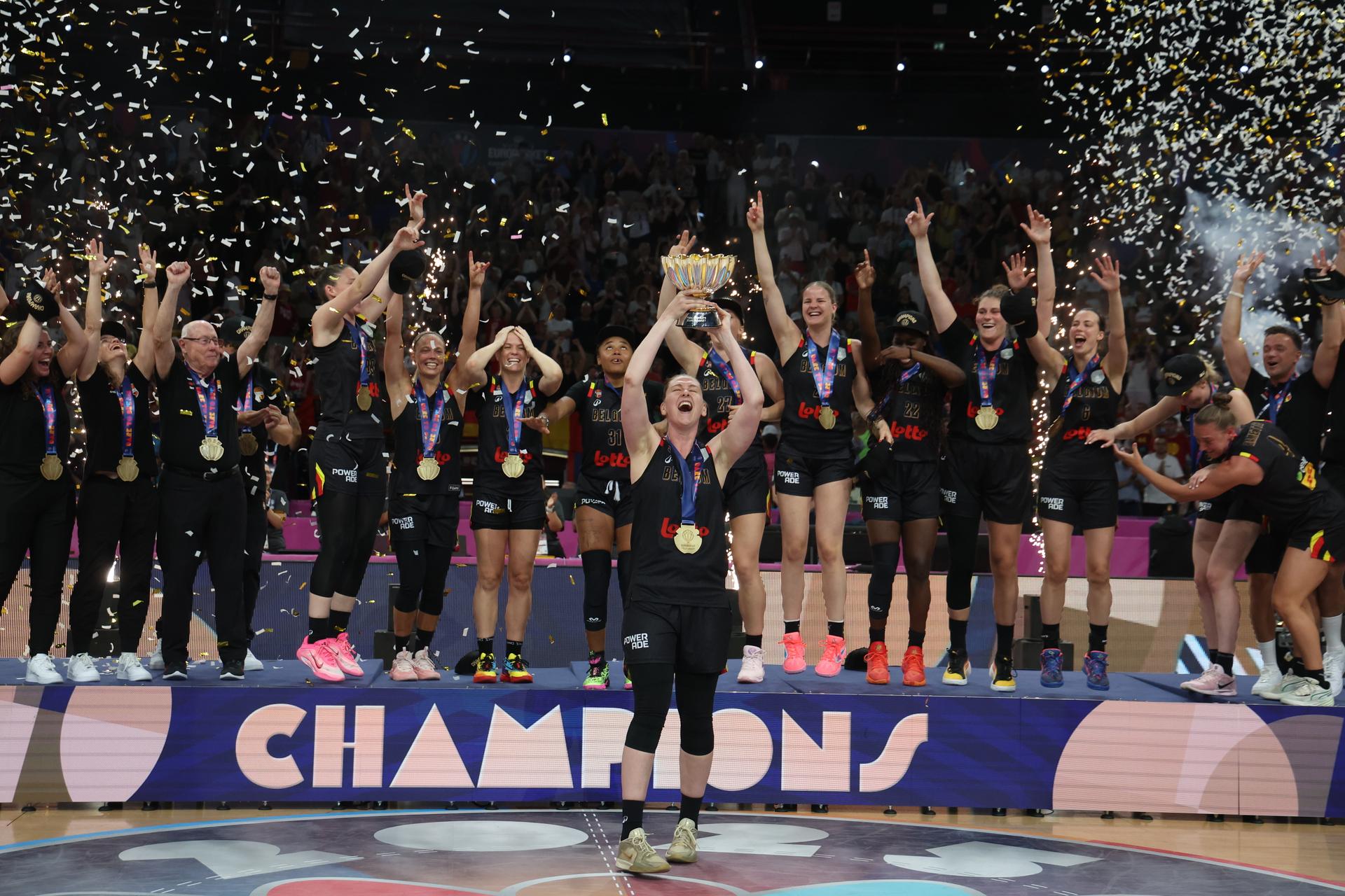 Belgium's captain Emma Meesseman celebrate this the cup on the podium after winning a basketball match between Spain and Belgian national team 'the Belgian Cats' on Sunday 29 June 2025 in Piraeus, Greece, the final of the FIBA Women's EuroBasket 2025. BELGA PHOTO VIRGINIE LEFOUR