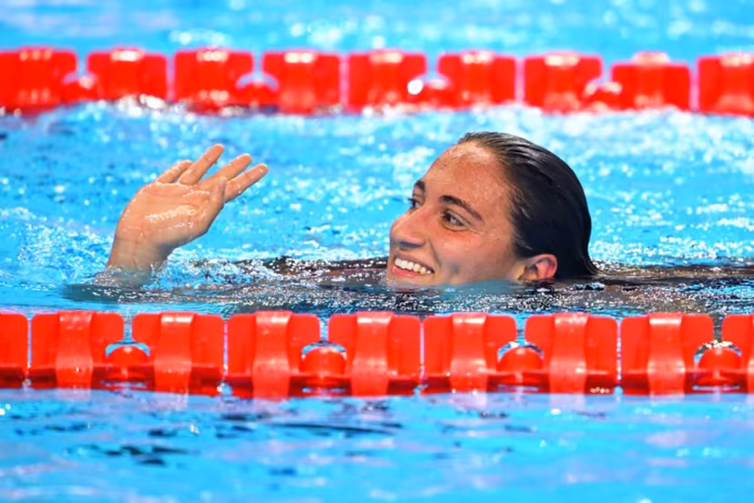 Italy's swimmer Simona Quadarella celebrates finishing second in the final of the women's 1500m freestyle swimming event during the 2025 World Aquatics Championships in Singapore on July 29, 2025. François-Xavier MARIT / AFP