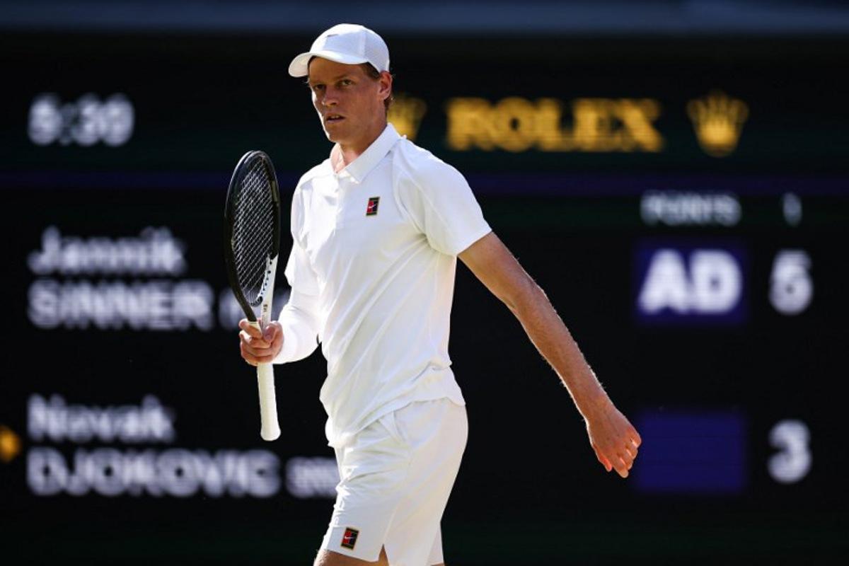 Italy's Jannik Sinner celebrates winning the first set against Serbia's Novak Djokovic during their men's singles semi-final tennis match on the twelfth day of the 2025 Wimbledon Championships at The All England Lawn Tennis and Croquet Club in Wimbledon, southwest London, on July 11, 2025. HENRY NICHOLLS / AFP