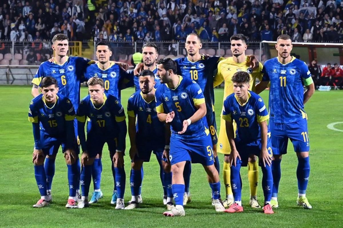 (Top L-R) Bosnia and Herzegovina's midfielder #06 Benjamin Tahirovic, Bosnia and Herzegovina's forward #20 Haris Hajradinovic, Bosnia and Herzegovina's defender #03 Ermin Bicakcic, Bosnia and Herzegovina's defender #18 Nikola Katic, Bosnia and Herzegovina's goalkeeper #01 Nikola Vasilj, Bosnia and Herzegovina's forward #11 Edin Dzeko, (bottom L-R) Bosnia and Herzegovina's midfielder #15 Armin Gigovic, Bosnia and Herzegovina's midfielder #17 Dzenis Burnic, Bosnia and Herzegovina's defender #04 Jusuf Gazibegovic, Bosnia and Herzegovina's defender #05 Sead Kolasinac and Bosnia and Herzegovina's midfielder #23 Esmir Bajraktarevic pose prior to the UEFA Nations League, League A - Group 3, football match between Bosnia and Herzegovina and Hungary at the Bilino Polje Stadium in Zenica, in Zenica, on October 14, 2024. Elvis Barukcic / AFP