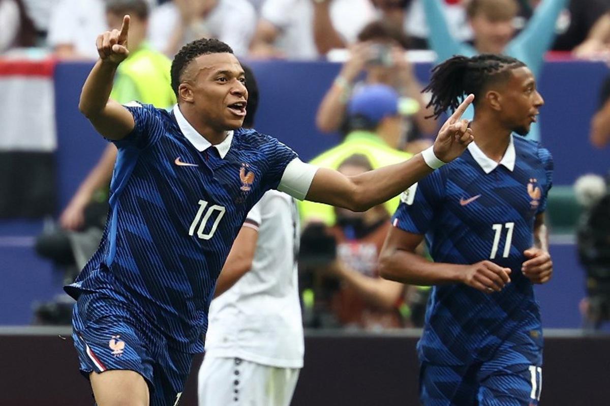 France's forward #10 Kylian Mbappe celebrates scoring his team's first goal during the 2026 World Cup Group I football match between France and Iraq at the Philadelphia Stadium in Philadelphia on June 22, 2026. FRANCK FIFE / AFP