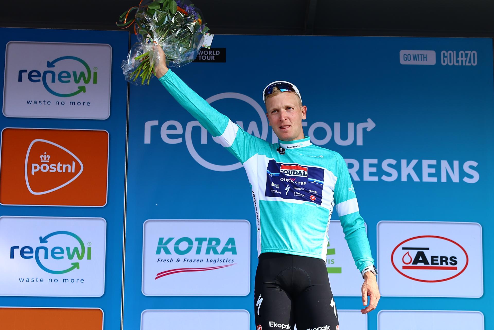 Belgian Tim Merlier of Soudal Quick-Step celebrates on the podium after winning the first stage of the 'Renewi Tour' multi-stage cycling race, from Terneuzen to Breskens, The Netherlands (182,7 km) on Wednesday 20 August 2025. The five-day race takes place in Belgium and the Netherlands. BELGA PHOTO DAVID PINTENS
