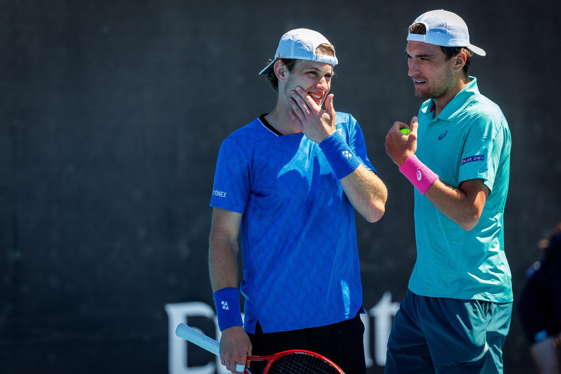 Belgian Zizou Bergs and Belgian Raphael Collignon pictured during a first round match of Belgium's Bergs/Collignon against Australia's pair McCabe/Tu in the men doubles at the Australian Open, Melbourne Park, Melbourne on Wednesday 21 January 2026. McCabe/Tu won the game. BELGA PHOTO PATRICK HAMILTON --- BENELUX ONLY ---