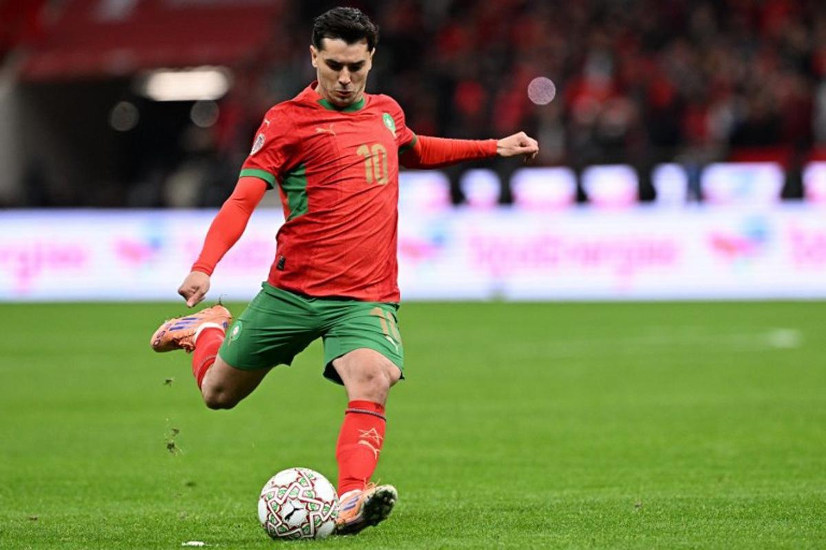 Morocco's forward #10 Brahim Diaz takes a free kick during the Africa Cup of Nations (CAN) Group A football match between Morocco and Mali at Prince Moulay Abdellah Stadium in Rabat on December 26, 2025. Gabriel BOUYS / AFP