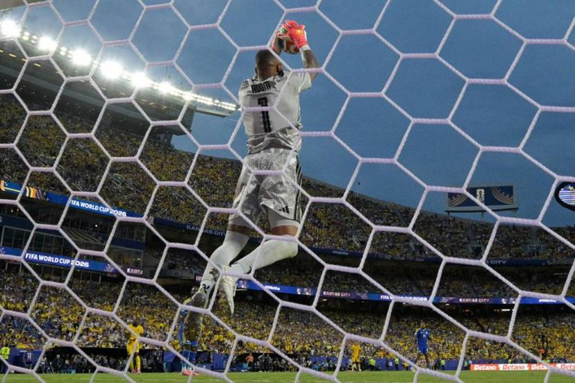 Curacao's goalkeeper #01 Eloy Room makes a save during the 2026 World Cup Group E football match between Ecuador and Curacao at the Kansas City Stadium in Kansas City on June 20, 2026. JUAN MABROMATA / AFP