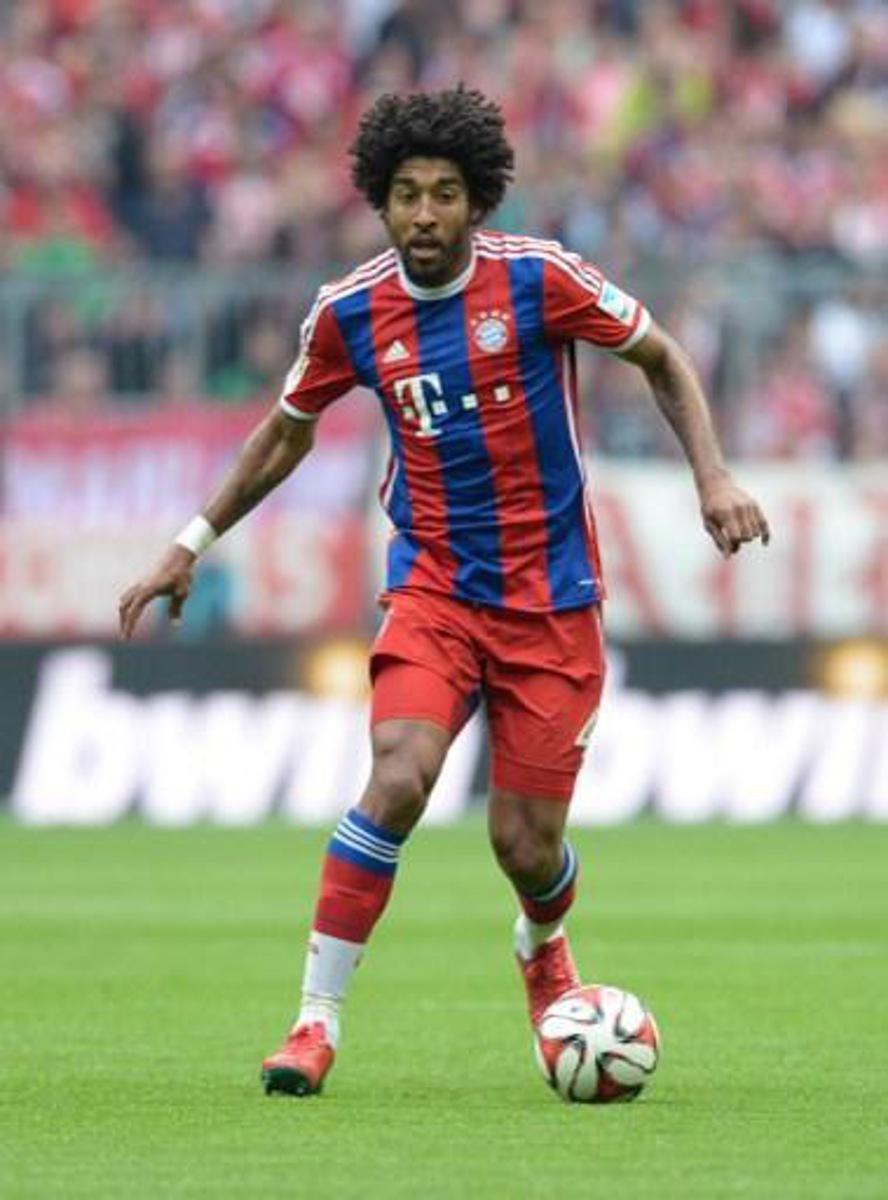 Bayern Munich's Brazilian defender Dante plays during the German first division Bundesliga football match between FC Bayern Munich and Hertha BSC Berlin at the Allianz Arena in Munich, southern Germany on April 25, 2015. Dante will leave Bayern Munich and join Wolfsburg, said the club on August 30. AFP PHOTO / CHRISTOF STACHE RESTRICTIONS - DFL RULES TO LIMIT THE ONLINE USAGE DURING MATCH TIME TO 15 PICTURES PER MATCH. IMAGE SEQUENCES TO SIMULATE VIDEO IS NOT ALLOWED AT ANY TIME. FOR FURTHER QUERIES PLEASE CONTACT DFL DIRECTLY AT + 49 69 650050.