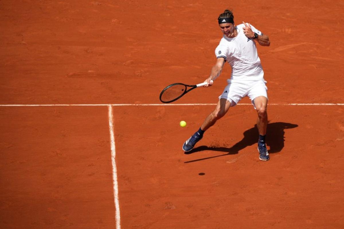 Germany's Alexander Zverev plays a forehand return to France's Benjamin Bonzi during their men's singles match on day 1 of the French Open tennis tournament on Court Philippe-Chatrier at the Roland-Garros Complex in Paris on May 24, 2026. Dimitar DILKOFF / AFP