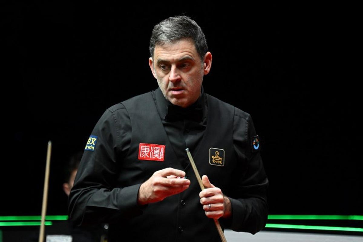 Britain's Ronnie O'Sullivan prepares to play a shot against compatriot Joe O'Connor in round 1 of the Snooker World Grand Prix 2026 in Hong Kong on February 4, 2026. Peter PARKS / AFP