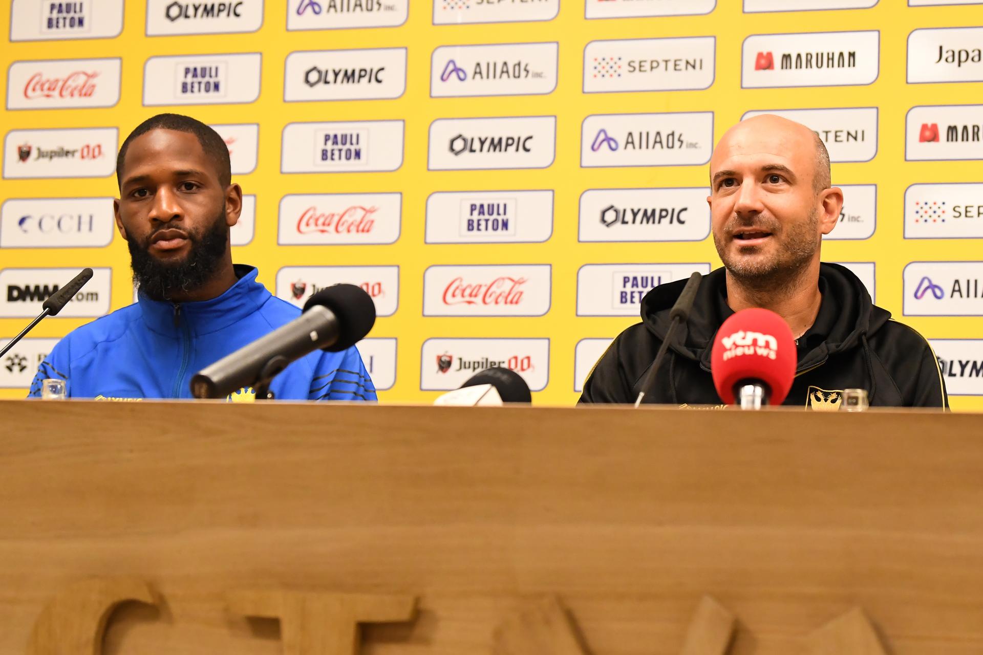 STVV's Abdoulaye Sissako and STVV's head coach Frederic De Meyer pictured during a press conference of Belgian soccer team Sint-Truidense V.V., Wednesday 19 August 2026 in Sint-Truiden, in preparations of the first leg of the play-off round for the UEFA Europa League league phase, against Cypriot team AC Omonoia Nicosia. BELGA PHOTO JILL DELSAUX
