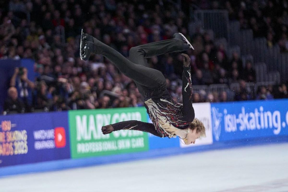 USA's Ilia Malinin does a back flip during the Men's Free Skating program of the 2025 ISU World Figure Skating Championships at TD Garden in Boston, Massachusetts, on March 29, 2025. Geoff Robins / AFP