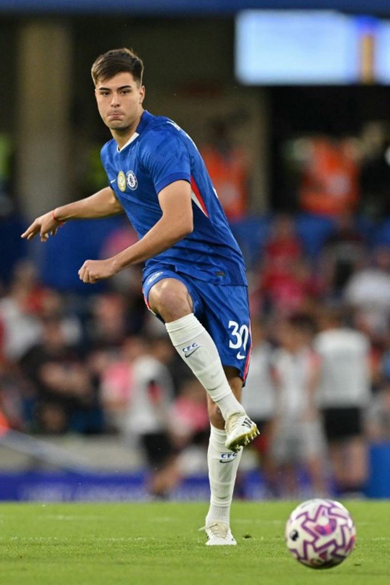 Chelsea's Argentinian defender #30 Aaron Anselmino passes the ball during the pre-season friendly football match between Chelsea and Bayer Leverkusen at Stamford Bridge in London on August 8, 2025. Glyn KIRK / AFP