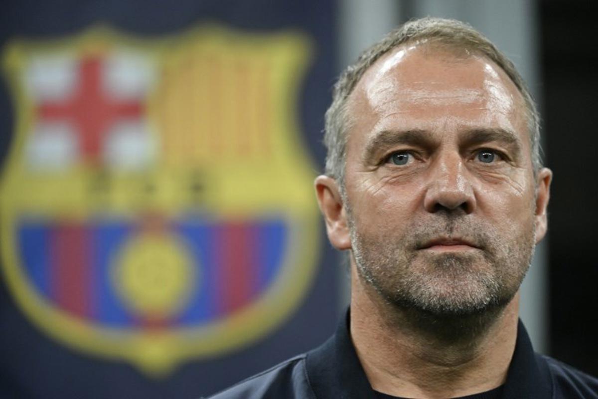Barcelona's German coach Hans-Dieter Flick looks on before the start of the UEFA Champions League semi-final second leg football match between Inter Milan and FC Barcelona at the San Siro stadium in Milan on May 6, 2025. PIERO CRUCIATTI / AFP