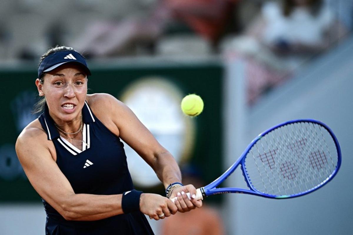 US Jessica Pegula plays a backhand return to Australia's Kimberly Birrell during their women's singles match on day 3 of the French Open tennis tournament on Court Simonne-Mathieu at the Roland-Garros Complex in Paris on May 26, 2026. JULIEN DE ROSA / AFP