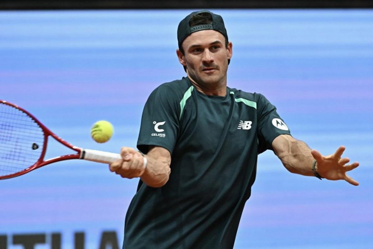 USA's Tommy Paul returns a shot to Argentina's Thiago Tirante during their 2026 ATP Tour Madrid Open tennis tournament second round singles match at the Caja Magica in Madrid, on April 24, 2026. Javier SORIANO / AFP