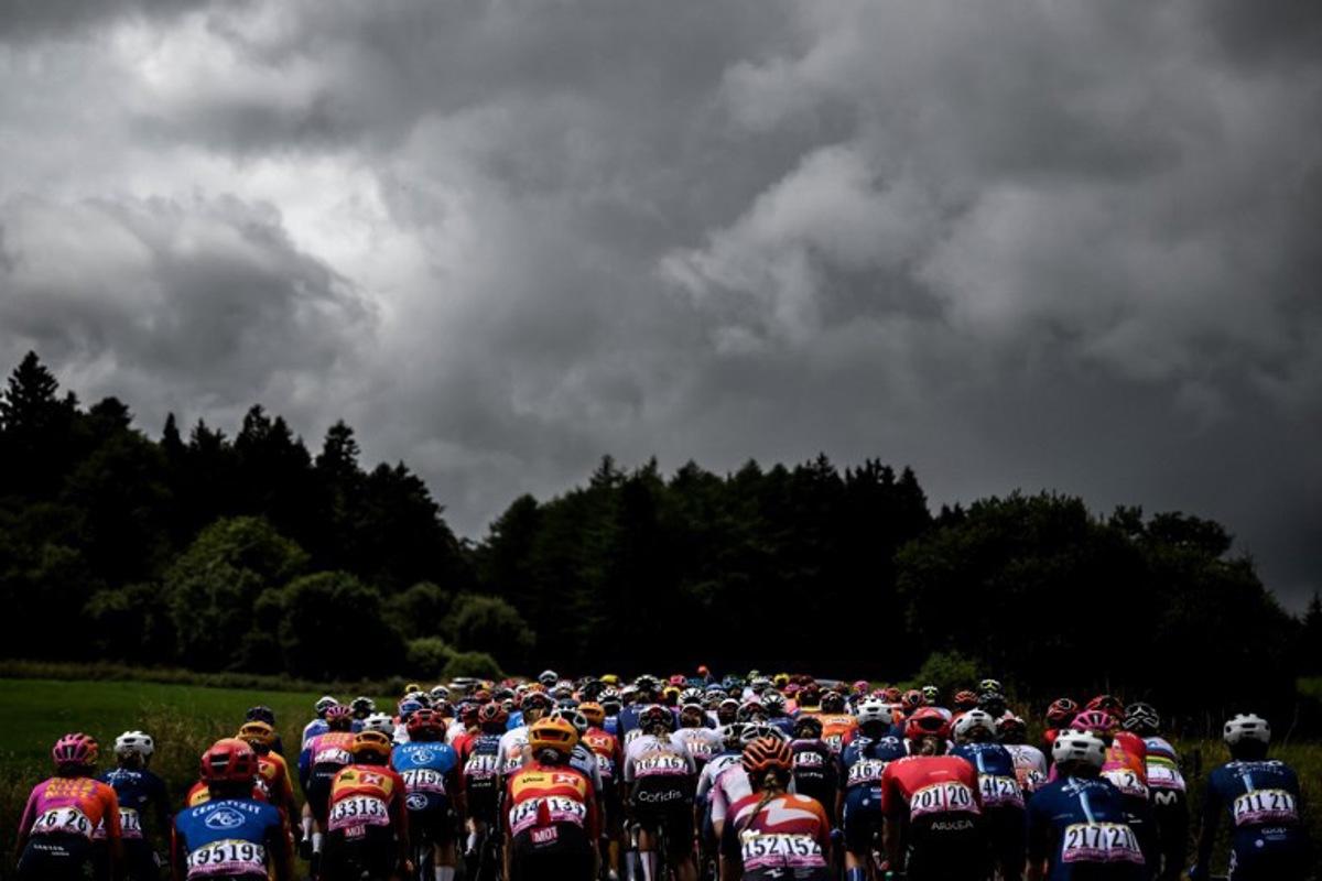 The pack rides during the second stage (out of 8) of the second edition of the Women's Tour de France cycling race 151 km between Clermont-Ferrand and Mauriac, in the Auvergne-Rhone-Alpes region, south-eastern France, on July 24, 2023. JEFF PACHOUD / AFP
