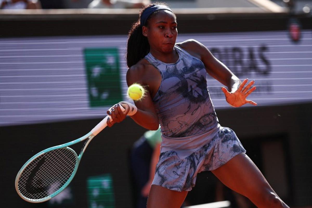 US Coco Gauff plays a forehand return to Czech Republic's Marie Bouzkova during their women's singles match on day 7 of the French Open tennis tournament on Court Philippe-Chatrier at the Roland-Garros Complex in Paris on May 31, 2025. Anne-Christine POUJOULAT / AFP