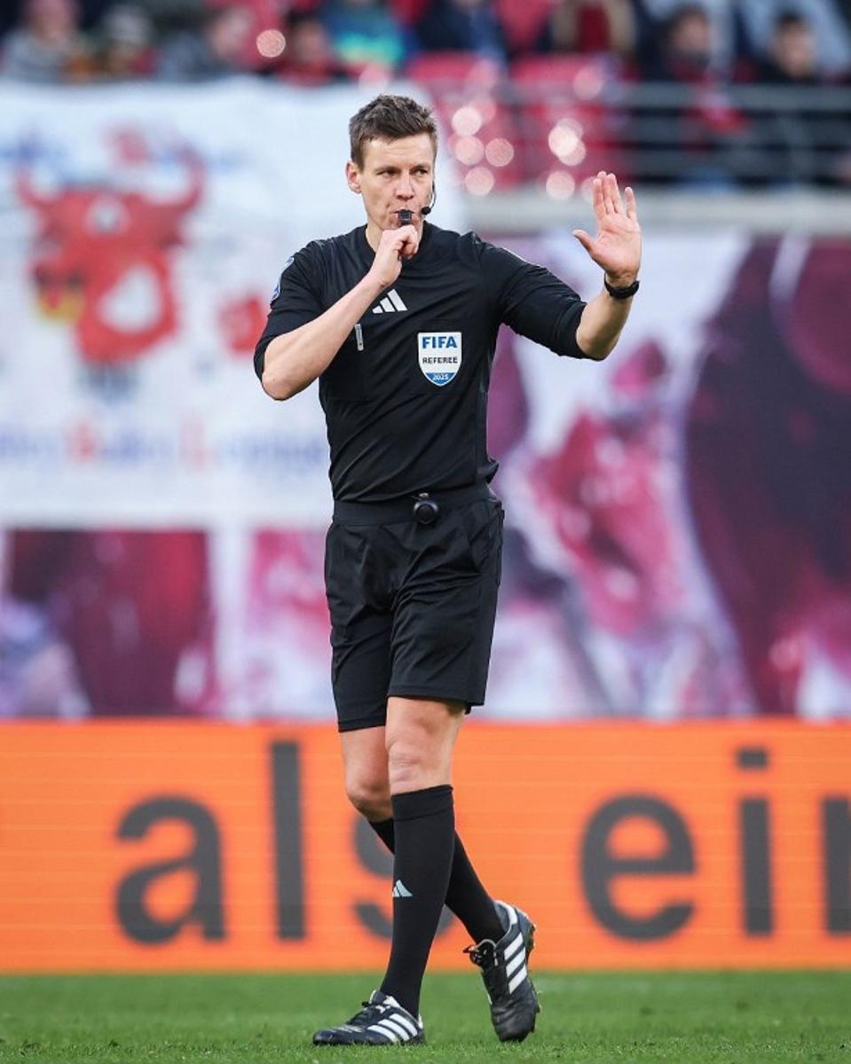 German referee Daniel Siebert reacts during the German first division Bundesliga football match between RB Leipzig and 1 FSV Mainz 05 in Leipzig, eastern Germany on March 1, 2025. Ronny Hartmann / AFP