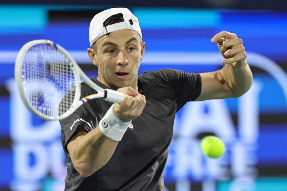 Netherlands' Tallon Griekspoor returns a shot during his men's singles semi-final match against Russia's Andrey Rublev at the Dubai Duty Free Tennis tournament in Dubai on February 27, 2026. Fadel SENNA / AFP