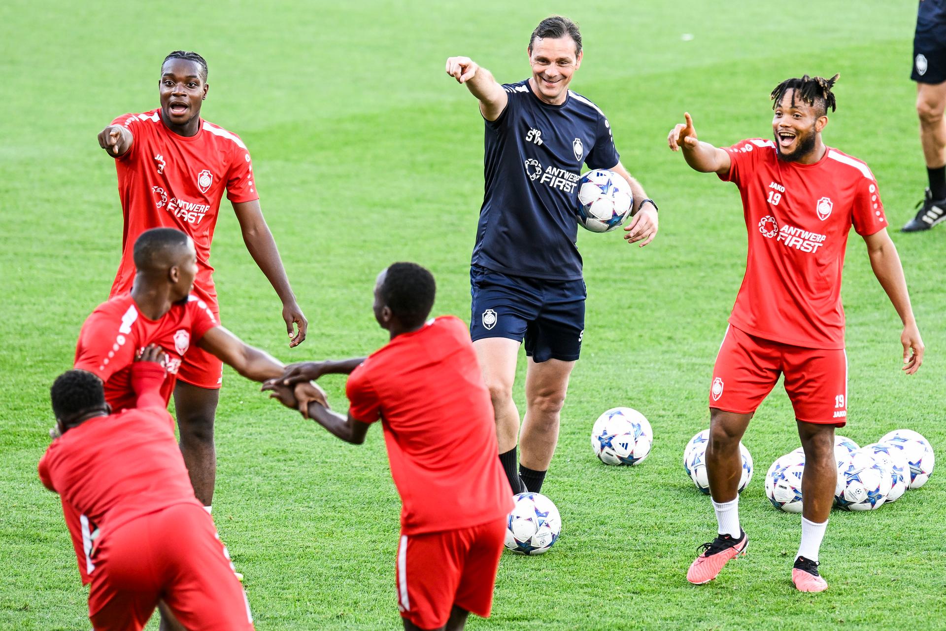 Antwerp's George Ilenikhena, Antwerp's assistant coach Stef Wils and Antwerp's Chidera Ejuke pictured during a training session of Belgian soccer team Royal Antwerp FC, on Monday 18 September 2023 in Barcelona, Spain. The team is preparing for tomorrow's game against FC Barcelona, on day 1 of the Champions League group stage. BELGA PHOTO TOM GOYVAERTS