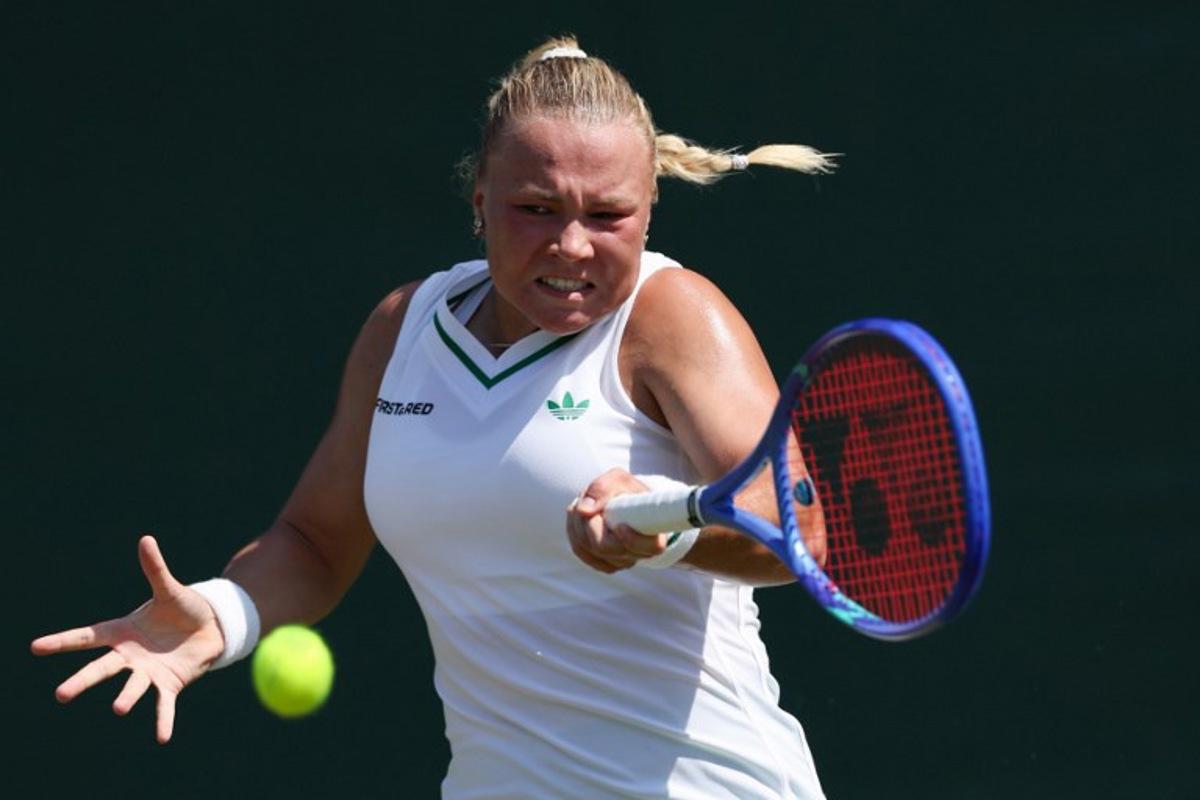 Russia's Diana Shnaider plays a forehand return to Japan's Moyuka Uchijima during their women's singles first round tennis match on the first day of the 2025 Wimbledon Championships at The All England Lawn Tennis and Croquet Club in Wimbledon, southwest London, on June 30, 2025. Adrian Dennis / AFP