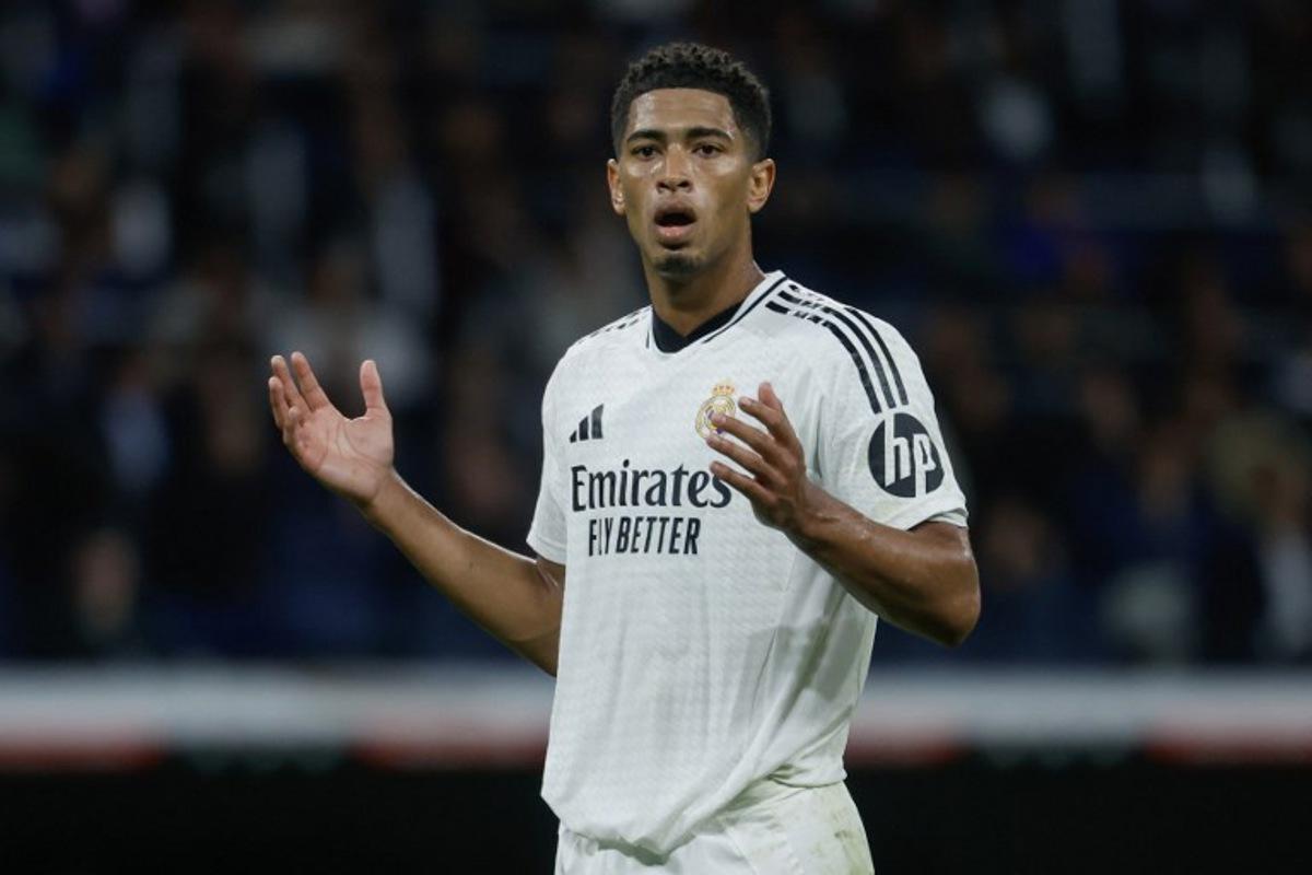 Real Madrid's English midfielder #05 Jude Bellingham reacts during the Spanish league football match between Real Madrid CF and RCD Mallorca at the Santiago Bernabeu Stadium in Madrid, on May 14, 2025. Pierre-Philippe MARCOU / AFP