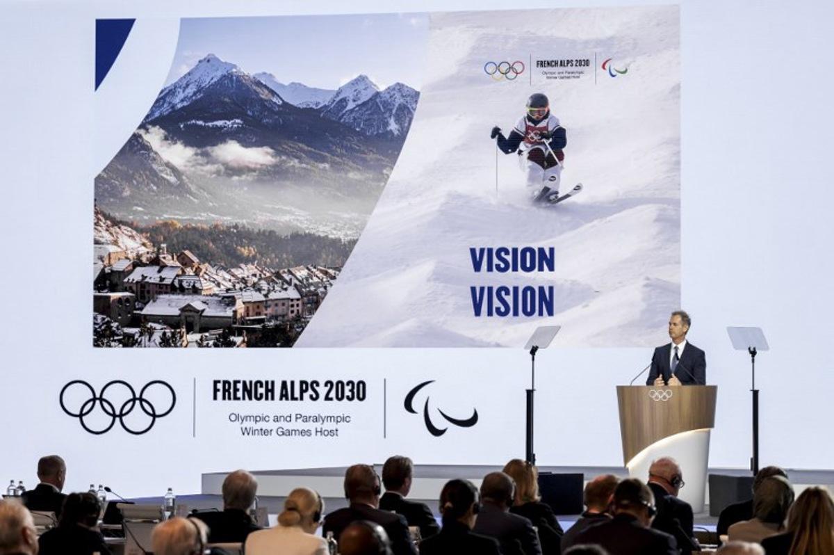 French Alps 2030 Olympics President Edgar Grospiron speaks during the 144th session of the International Olympic Committee (IOC), in Costa Navarino, Greece, on the election day of the next IOC President, on March 20, 2025. Fabrice COFFRINI / AFP