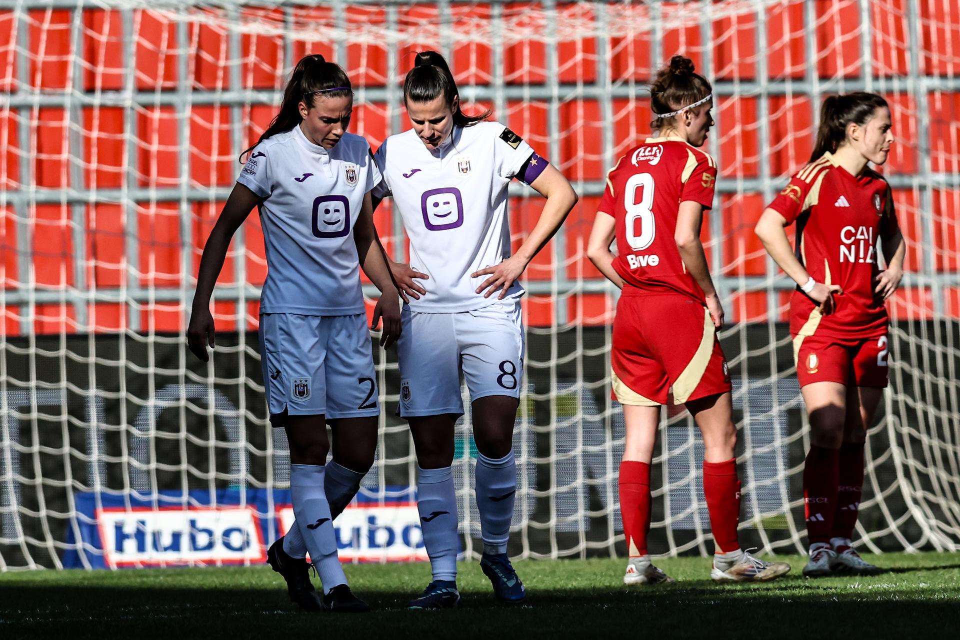 Anderlecht's Marie Minnaert and Anderlecht's Laura De Neve pictured during a female soccer game between Standard Femina and RSCA Women, Saturday 08 March 2025 in Liege, on day 18 of the 2024 - 2025 season of Belgian Lotto Womens Super League. BELGA PHOTO BRUNO FAHY