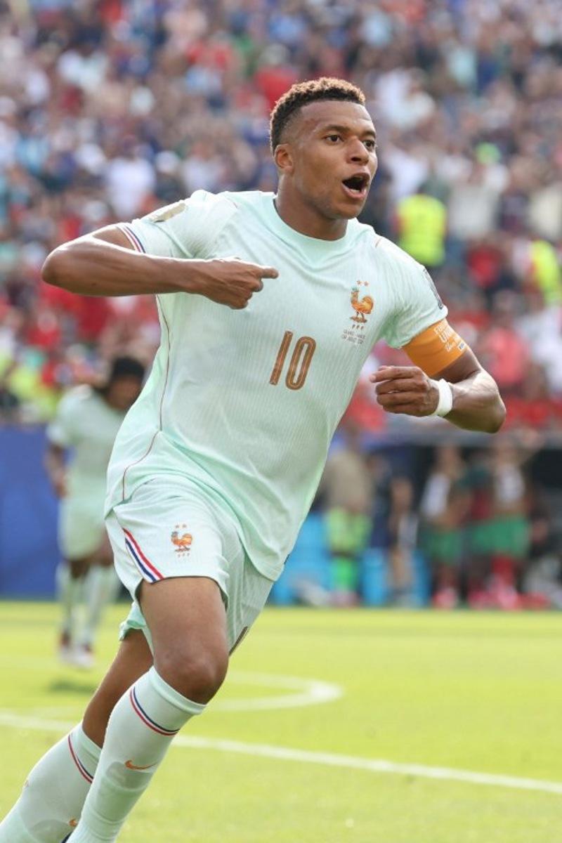 France's forward #10 Kylian Mbappe celebrates scoring his team's first goal during the 2026 World Cup football tournament quarter-final match between France and Morocco at Boston Stadium in Foxborough on July 9, 2026. Odd ANDERSEN / AFP