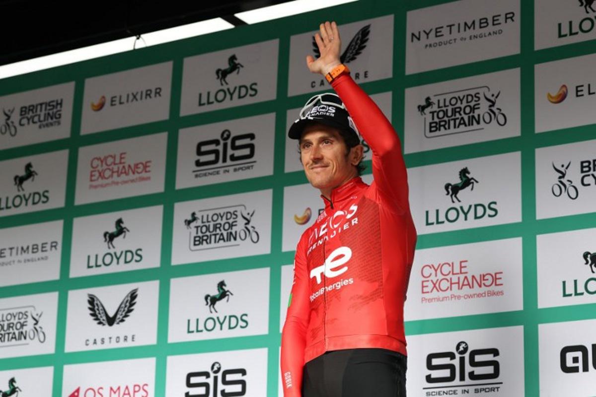 INEOS Grenadiers team's Welsh rider Geraint Thomas waves to the crowd on stage after the sixth stage of the Tour of Britain cycling race, in Cardiff on September 7, 2025, his final race. Darren Staples / AFP