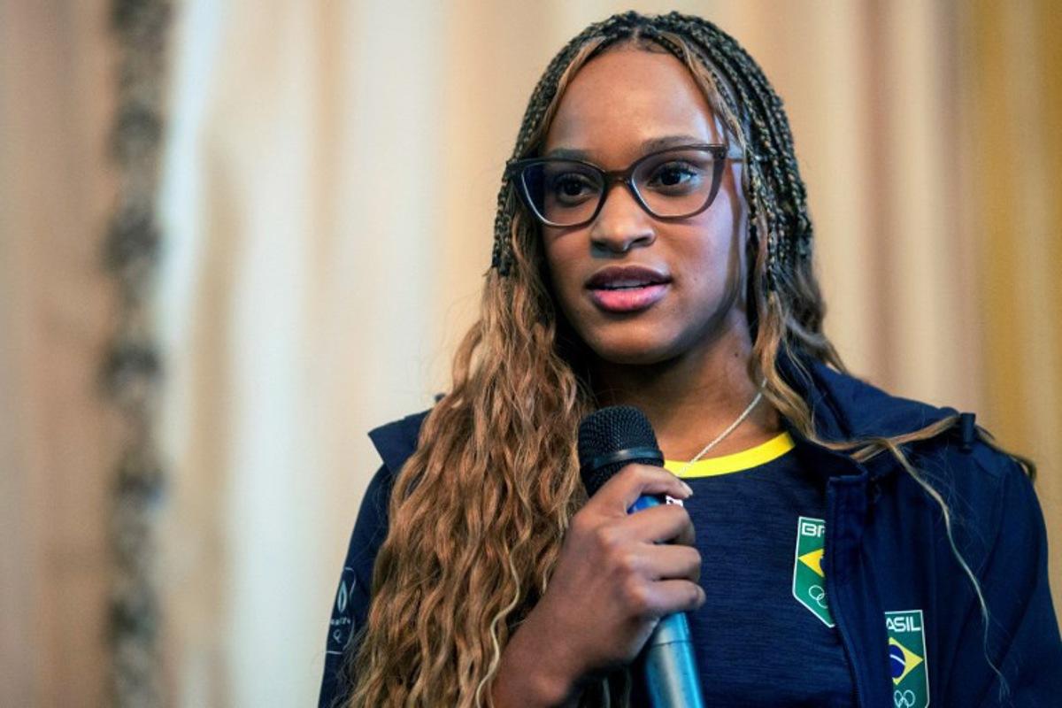 Brazil's olympic champion Rebeca Andrade speaks during a welcome ceremony for the olympic athletes at Rio de Janeiro Mayor's office, in Rio de Janeiro, Brazil, on August 15, 2024. Daniel RAMALHO / AFP