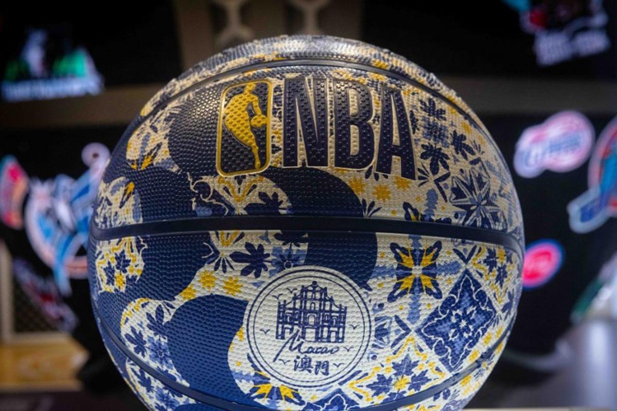 A customised Macau basketball stands at the Wilson stall at the NBA House before the NBA pre-season basketball game between the Phoenix Suns and Brooklyn Nets at the Venetian Arena in Macau on October 12, 2025. Eduardo Leal / AFP