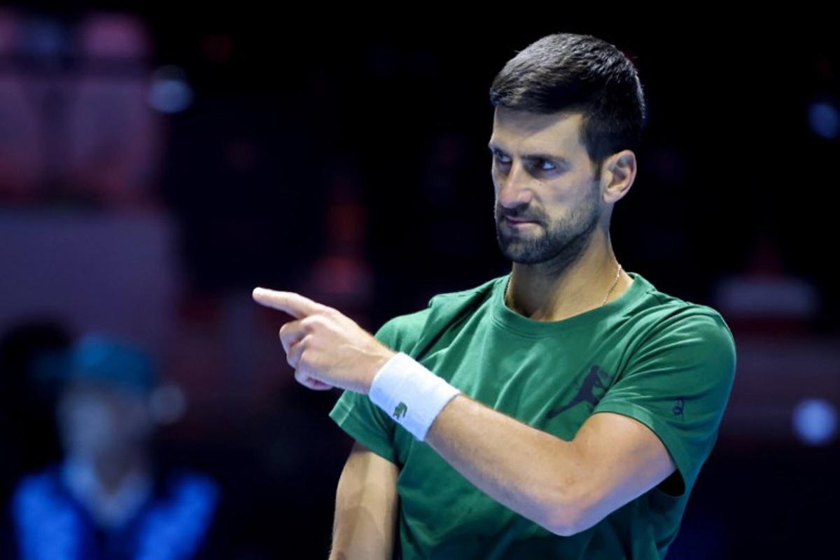 Serbia's Novak Djokovic gestures during the warm up ahead of the semi-final of the Six Kings Slam exhibition tennis tournament against Italy's Jannik Sinner in Riyadh on October 16, 2025. Fayez NURELDINE / AFP