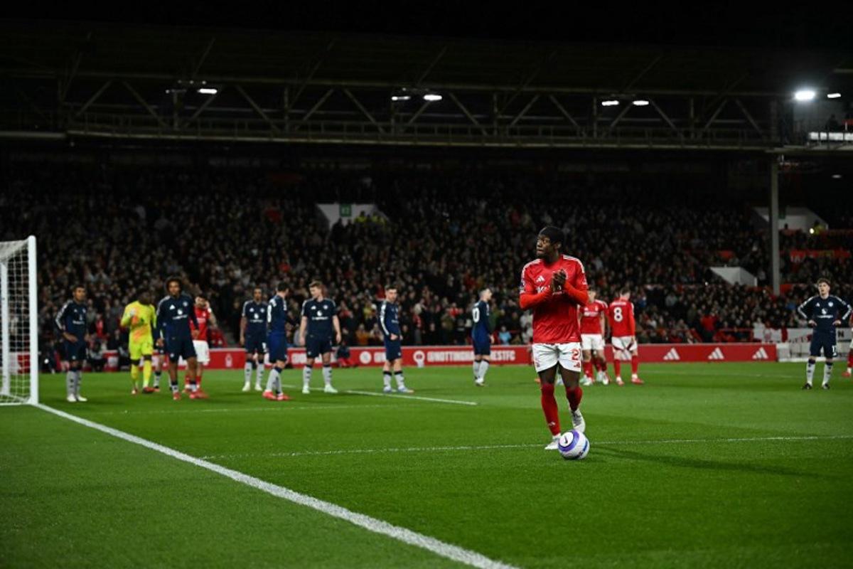 Nottingham Forest's Swedish midfielder #21 Anthony Elanga walks to take a corner kick during the English Premier League football match between Nottingham Forest and Manchester United at The City Ground in Nottingham, central England, on April 1, 2025. Paul ELLIS / AFP