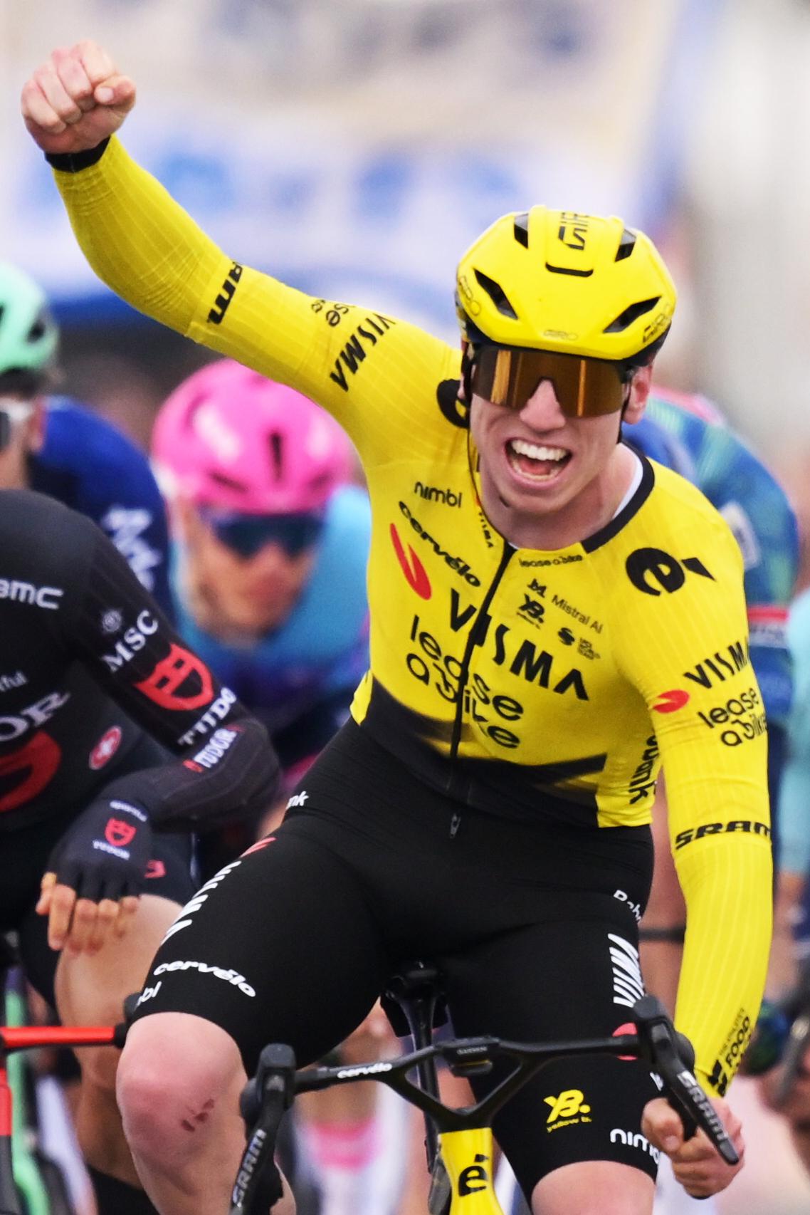 Great Britain's Matthew Brennan of Team Visma-Lease a Bike crosses the finish line to win the 78th edition of the men elite race of the Kuurne-Brussels-Kuurne one day cycling race, 195 km from Kuurne to Kuurne via Brussels, Sunday 01 March 2026. BELGA PHOTO DAVID PINTENS