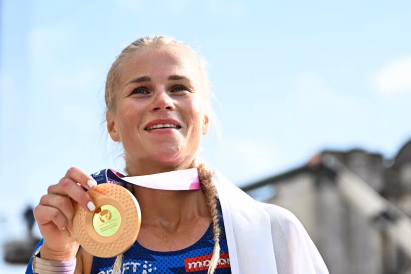 Gold medallist Finland's Alisa Vainio celebrates after winning the women's marathon during the European Athletics Championships in Birmingham on August 16, 2026. Paul ELLIS / AFP