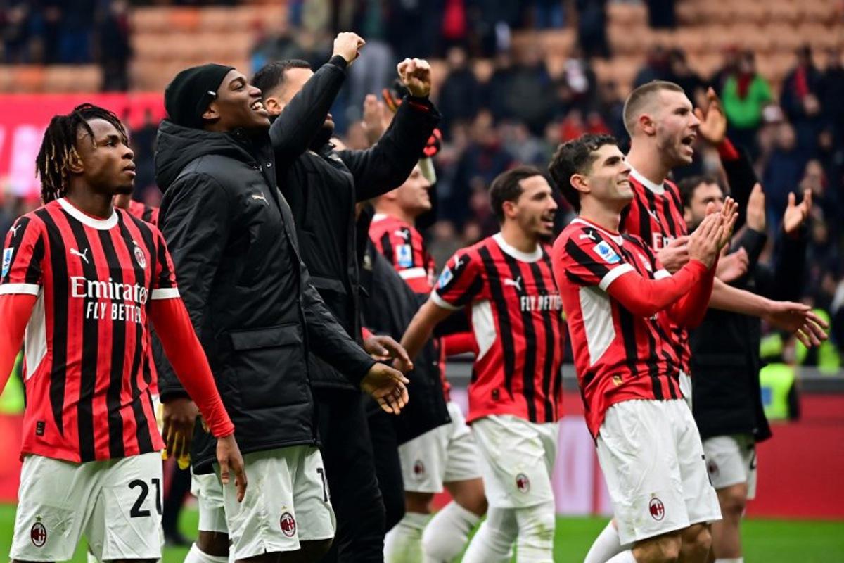 AC Milan's players celebrate after winning the Italian Serie A football match between AC Milan and Parma at the San Siro Stadium in Milan, Italy on January 26, 2025. Piero CRUCIATTI / AFP