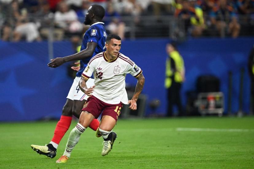 Spain's defender #12 Pedro Porro reacts after he scored his team's second goal during the 2026 World Cup football tournament semi-final match between France and Spain at the Dallas Stadium in Arlington on July 14, 2026. MAURO PIMENTEL / AFP