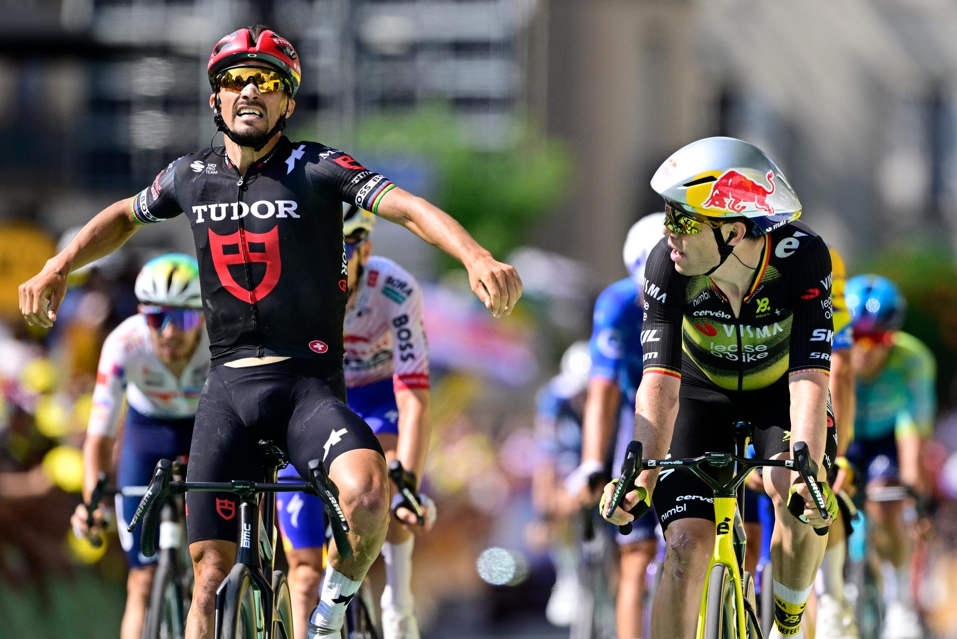 Belgian Wout van Aert of Team Visma-Lease a Bike looks at French Julian Alaphilippe of Tudor Pro Cycling Team at the finish of stage 15 of the 2025 Tour de France cycling race, from Muret to Carcasonne (169 km), on Sunday 20 July 2025 in France. The 112th edition of the Tour de France starts on Saturday 5 July in Lille, France, and will finish in Paris, France on the 27th of July. BELGA PHOTO DIRK WAEM
